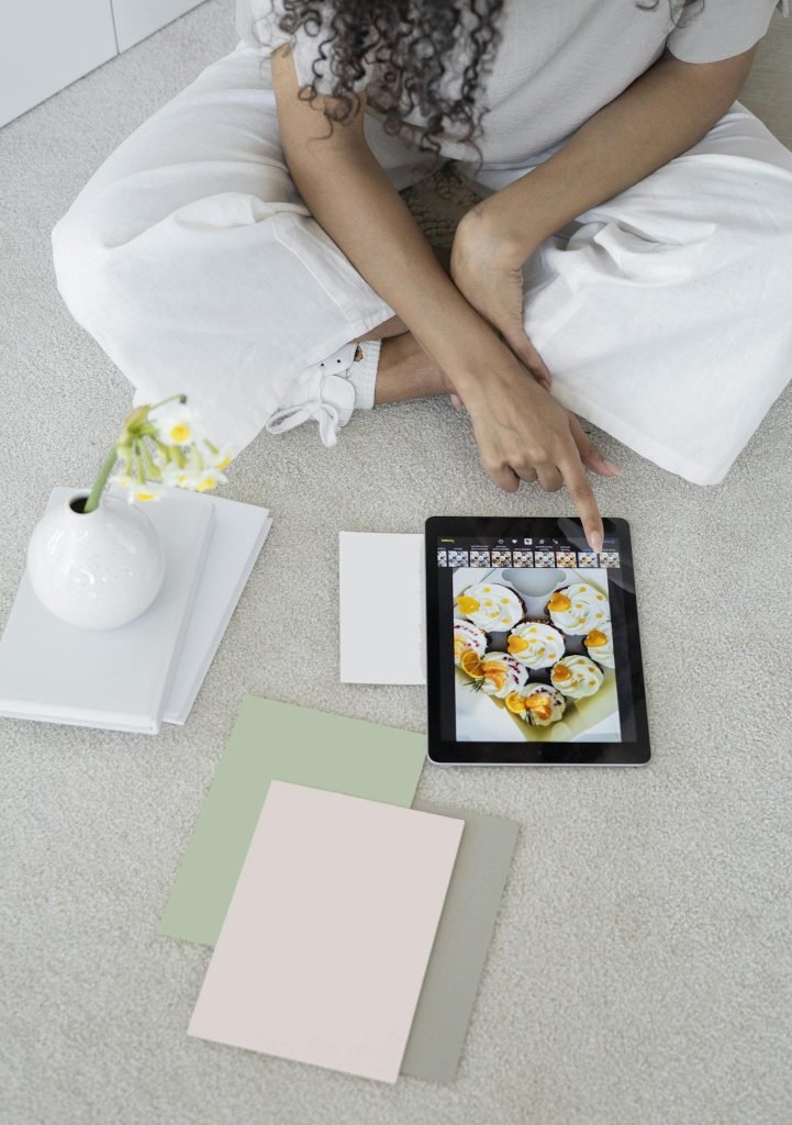 Person Holding Black Tablet Computer