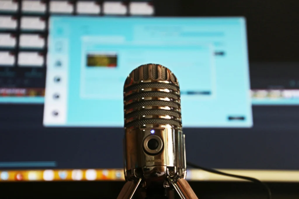 Amplify Your Reach: The Power of Podcast Marketing 3 podcast marketing
recording with microphone