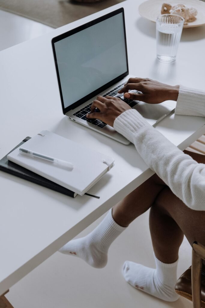 Launch Strategy & Funnel Support Services 3 launch strategy - a person typing on a laptop